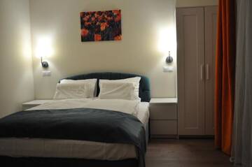 Фото номера Апартаменты с 1 спальней Гостевой дом Transylvania Villa &amp; Spa г. Мунтеле Бэйшори 4