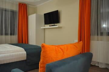 Фото номера Люкс с доступом в спа-центр Гостевой дом Transylvania Villa &amp; Spa г. Мунтеле Бэйшори 2